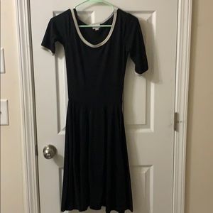 Black “Nicole” lularoe dress.